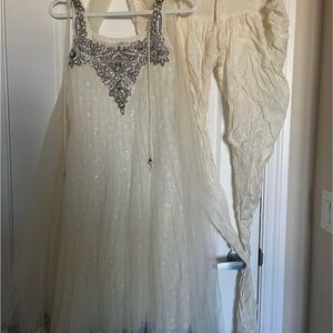 Elegant Cream Dress with Silver Embellishments